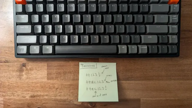 A sticky note with handwritten passwords.